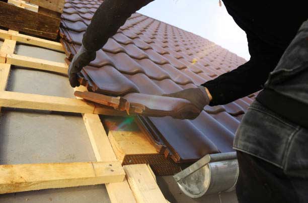Remplacement urgent de tuiles sur une maison en Gironde